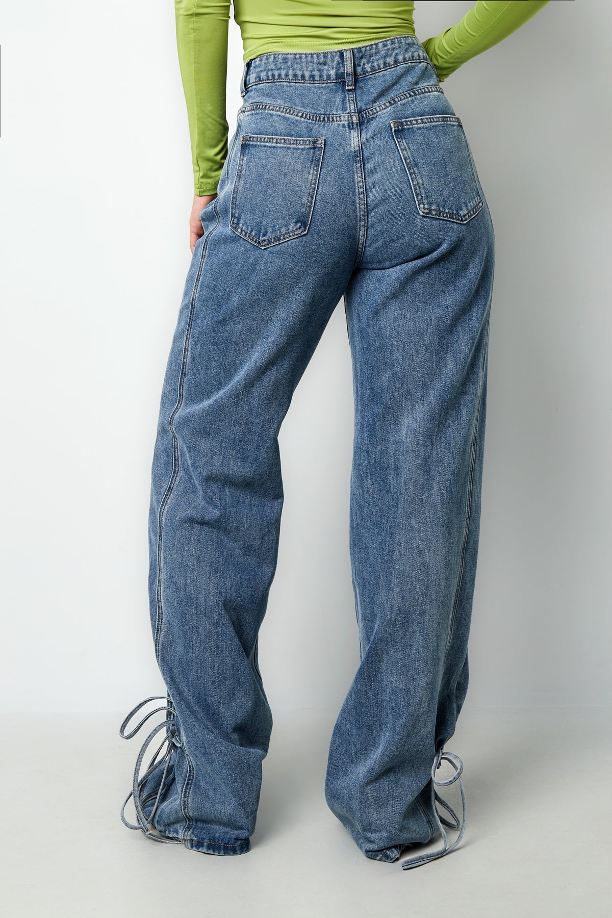 Jeans con fiocco bossy