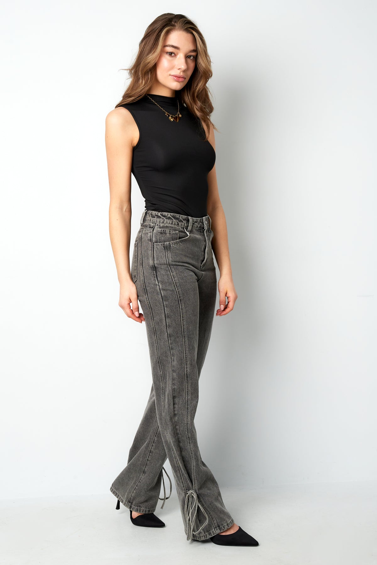 Jeans con fiocco bossy