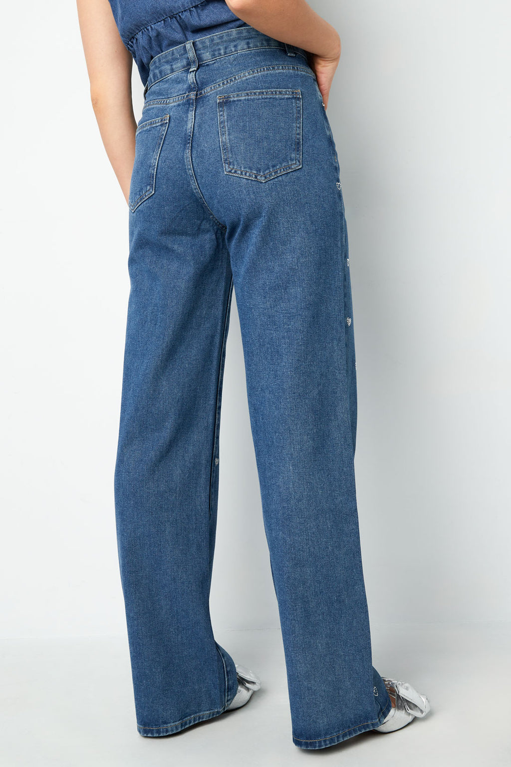 Jeans denim con cuore glitterato