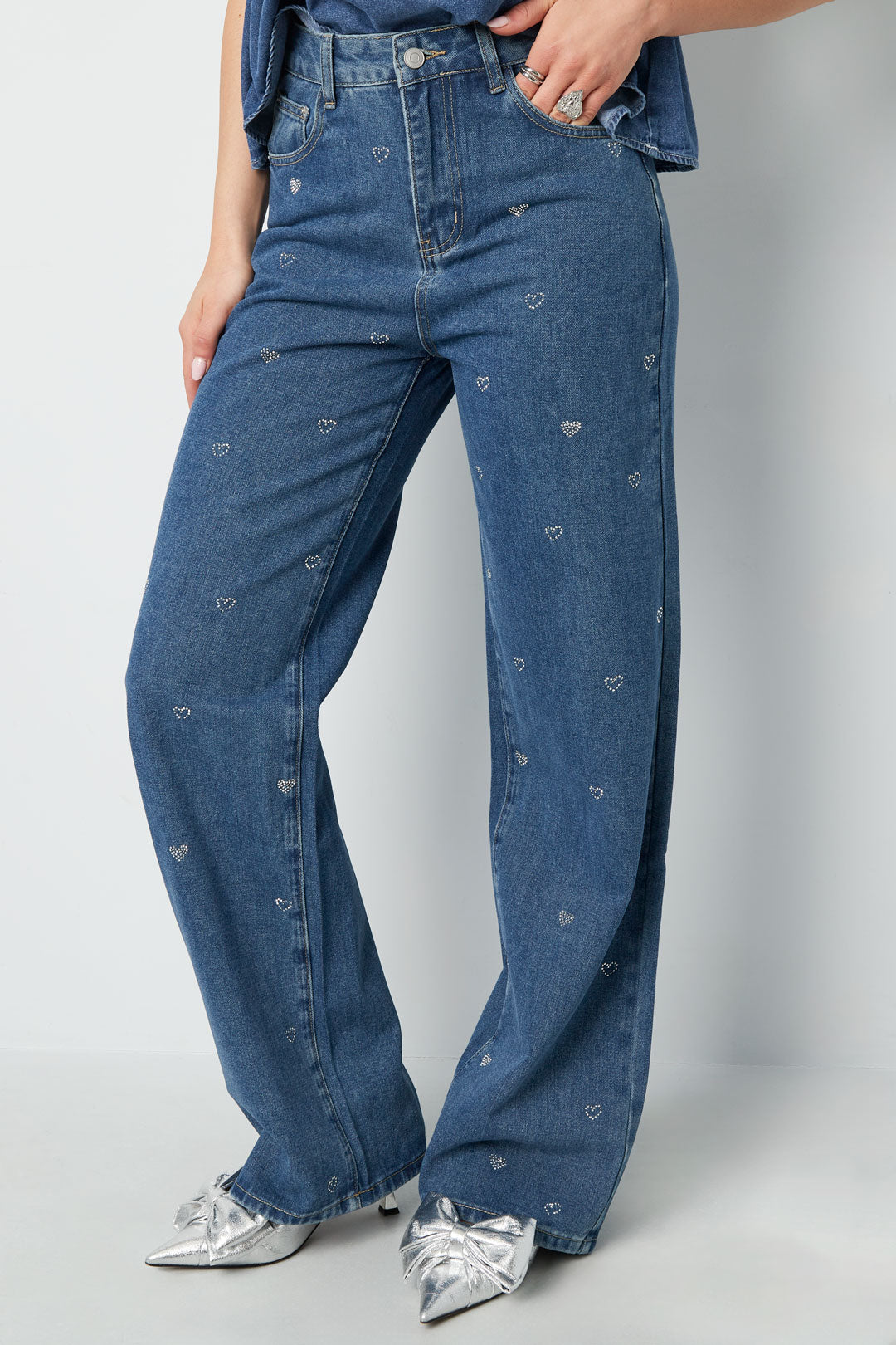 Jeans denim con cuore glitterato