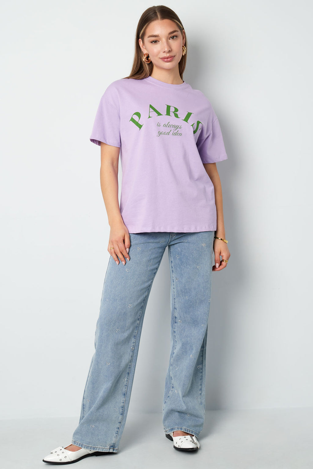 Jeans denim con cuore glitterato